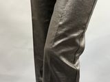 the legs of a woman in a pair of black leather pants