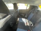 a view of the inside of a car from the driver ' s seat