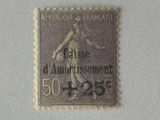 an old stamp with a picture of a man holding a tennis racquet