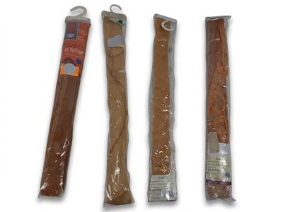 three different types of bread sticks are wrapped in plastic bags