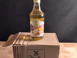 a bottle of alcohol sitting on top of a cardboard box