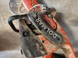 a chainsaw with a chain attached to it