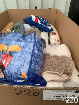 a cardboard box with a bunch of items inside of it