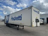 a semi truck that is parked in a parking lot