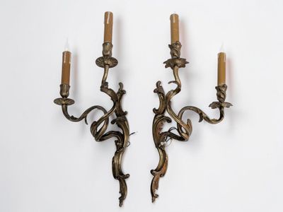 pair of antique brass wall sconces with candle holders