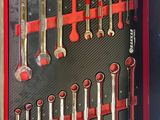 a red box with a bunch of wrenches in it