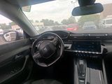 the interior of a car with a steering wheel, dashboard, and dash board