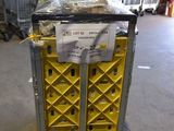 a cart with a bunch of boxes on it in a warehouse