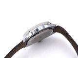 an image of a close up of a watch on a white surface