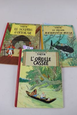 trois livres pour enfants posés sur une table blanche
