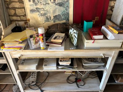 a table with a bunch of books on top of it