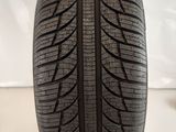a close up of a tire on a white surface
