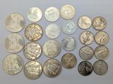 a lot of coins that are sitting on a table