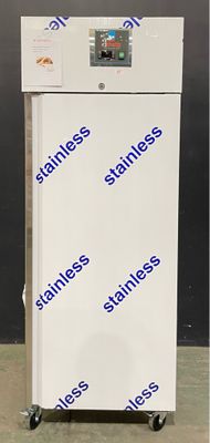 an image of a white refrigerator with blue writing on it