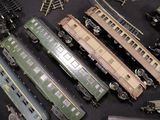 a lot of toy trains that are on the table