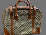 an image of a brown and white bag on a gray background