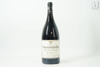a bottle of wine that is sitting on a table