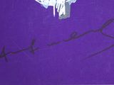 purple book cover with a drawing of a bird on it ' s back