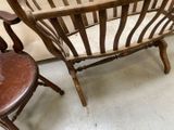 two chairs that are sitting next to each other in a room