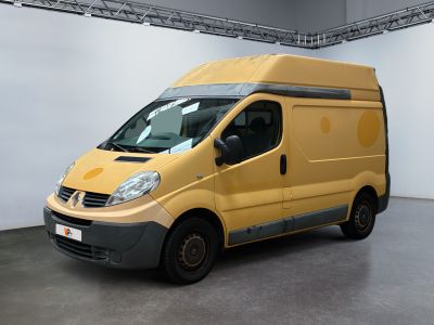 a yellow van that is parked inside of a building