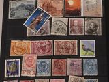 an image of a picture of a collection of stamps on a table