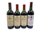 trois bouteilles de vin sont alignées sur une surface blanche