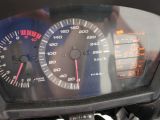 a close up of a speedometer on a motorcycle