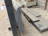 a pile of concrete blocks on the ground in a building