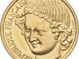 an image of a close up of a coin with a woman ' s face on it