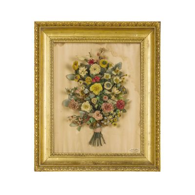 an old picture of a bouquet of flowers in a gold frame