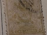 an old stamp with a picture of a dragon on it and a stamp with a picture of a dragon on it