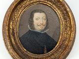 portrait d'un homme vêtu d'un manteau noir à col blanc