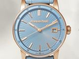 gros plan d'une montre-bracelet avec un cadran bleu