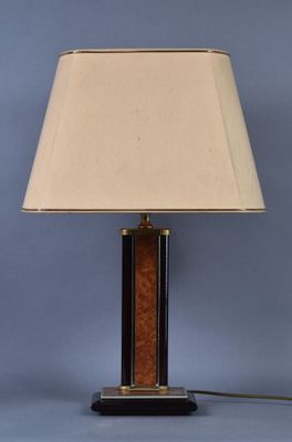 a lamp that is sitting on top of a table next to a lamp