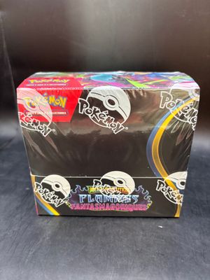 the box is full of different types of pokemon trading cards