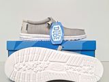 nike air footwear with a white sole and a blue shoe box