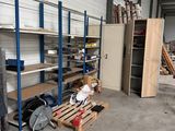a room with a lot of shelves and shelves in it