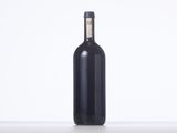 a bottle of wine that is sitting on a table