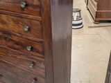 an image of a chest of drawers in a store
