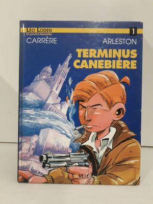 On peut voir la couverture du livre *Terminus* posée sur une table.