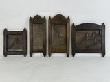 three wooden plaques with a picture of a man and a woman on them