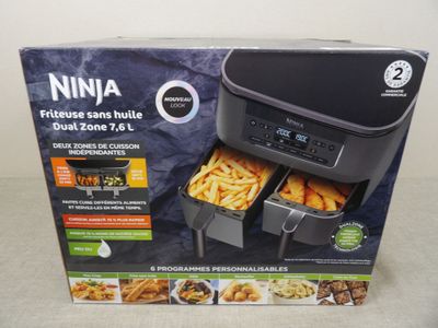 La boîte de la nouvelle friteuse à air chaud Ninja est ouverte et prête à l'emploi.