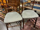 two chairs that are sitting next to each other