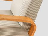 an image of a wooden chair with a striped cushion