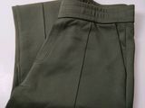 men ' s olive green dress pants on a white background