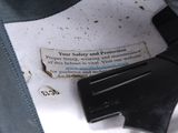 a close up of a piece of paper with a gun on it
