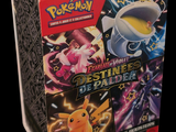 a box of pokemon trading card games on a table