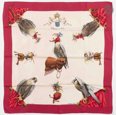 une image représentant une écharpe rouge et blanche ornée d'oiseaux