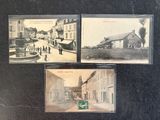 three old postcards of a street with buildings and a fountain