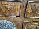 three pieces of art on the wall above a bed